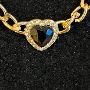 Black heart outlined in rhinestone necklace on gold tone 14 “